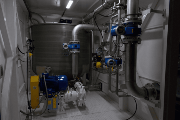 Process pipework and pump unit within bentonite slurry treatment ski