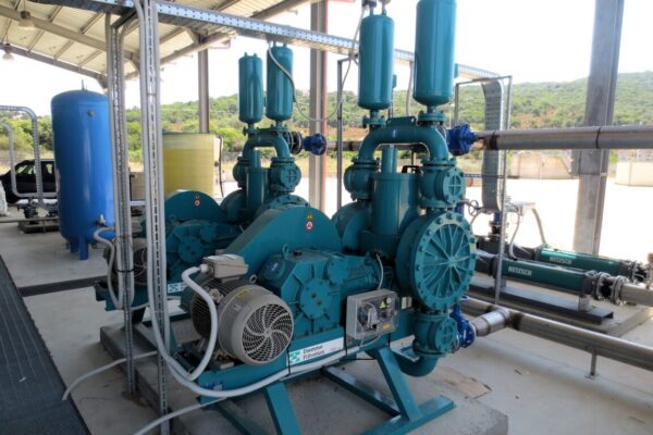 Powered diaphragm pump connected to bentonite slurry treatment skid